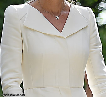 Kate Middleton Duchess of Cambridge bespoke wing lapel wool silk coat dress by Alexander McQueen Charlotte Christening 2015 detail