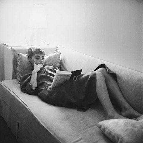 Audrey Hepburn loves reading and solitude, photo by Mark Shaw