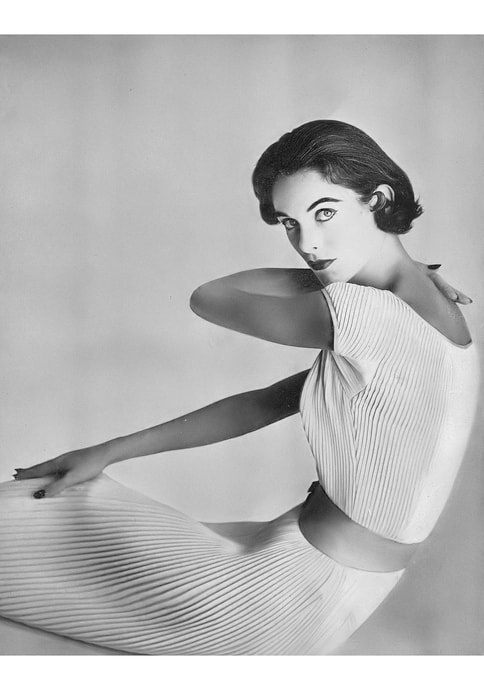 Anne Sainte Marie in Harvey Berin white rayon dress, Harpers Bazaar, photo by Gleb Derujisnky