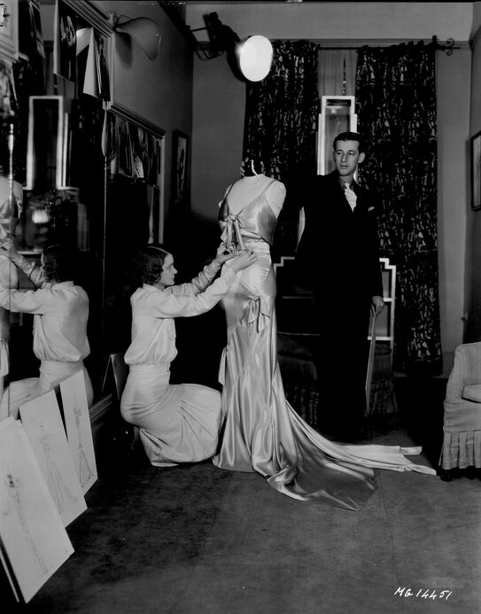 American costume designer Adrian working