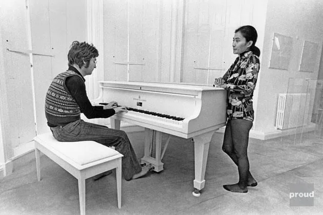 John Lennon with Yoko Ono in their apartment, 1971