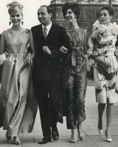 Italian designer Federico Forquet with his models