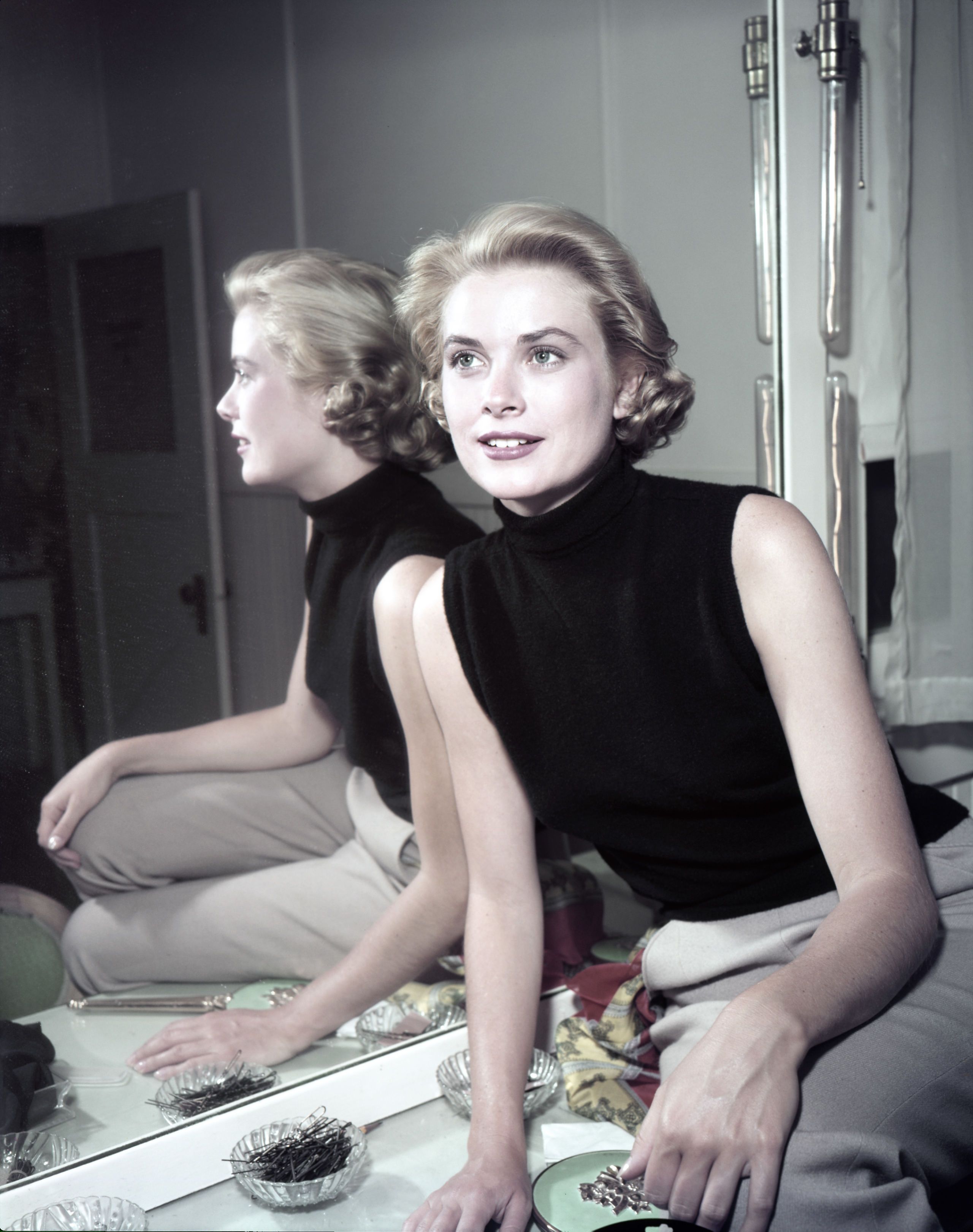 Elegant style icon wardrobe essentials: Grace Kelly in turtle neck sweater