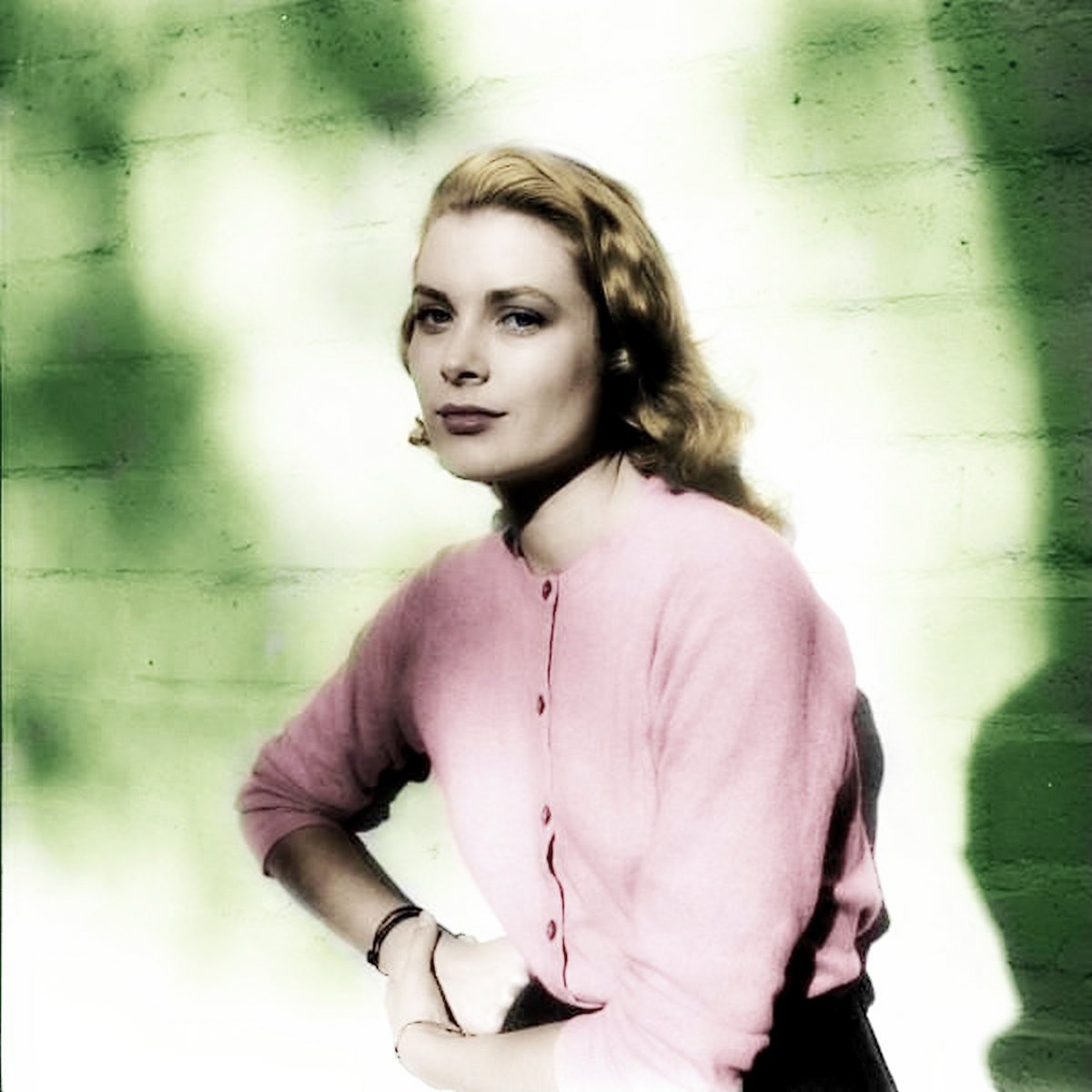 Elegant style icon wardrobe essentials: Grace Kelly in cardigan sweater