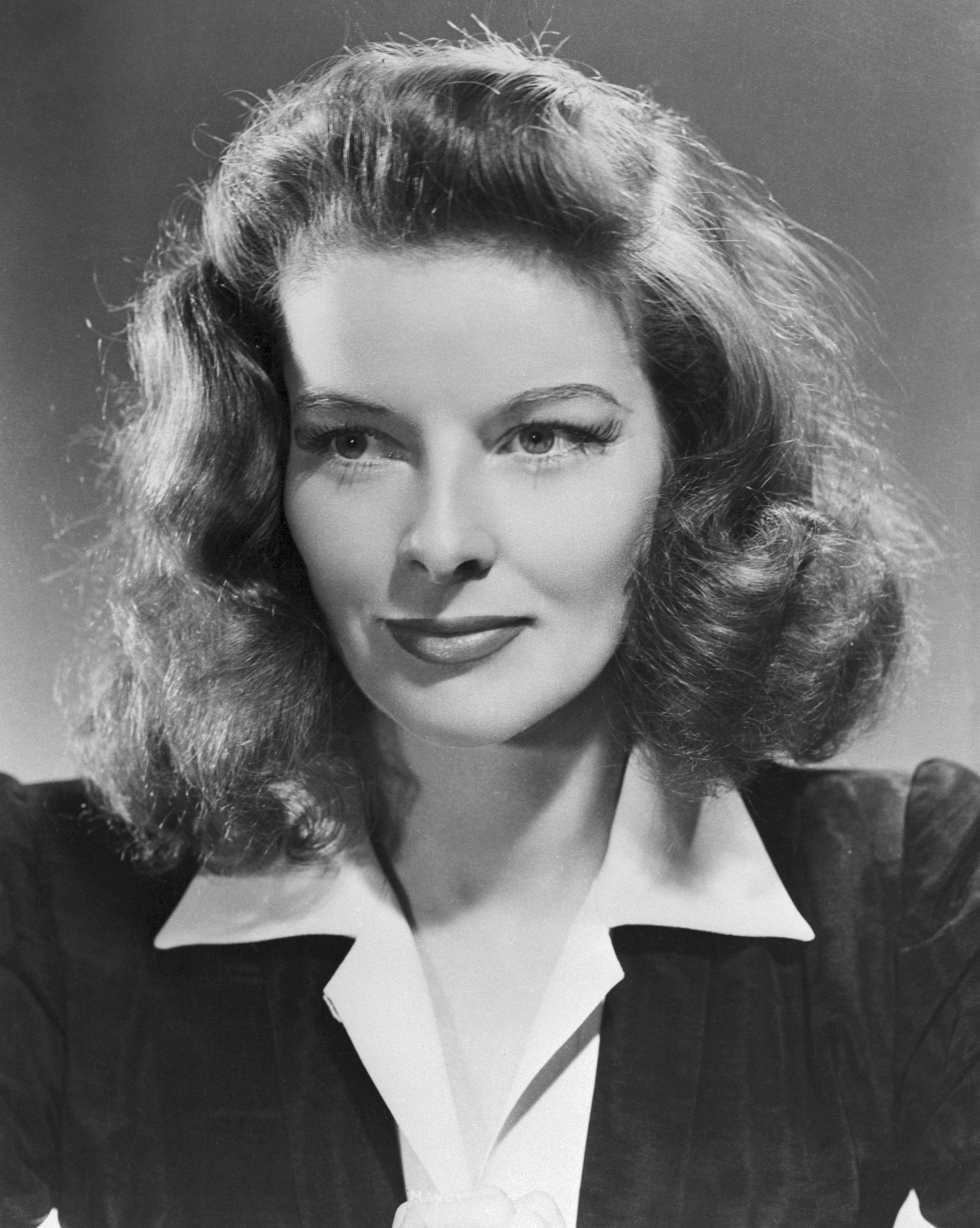 Elegant style icon wardrobe essentials: Kathrine Hepburn in white shirt