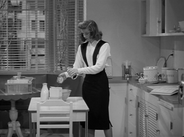 Elegant style icon wardrobe essentials: Kathrine Hepburn in white shirt