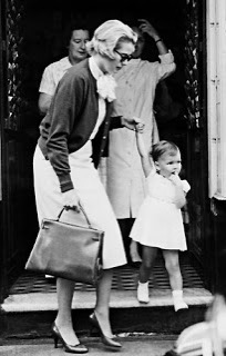 Elegant style icon wardrobe essentials: Grace Kelly in cardigan sweater