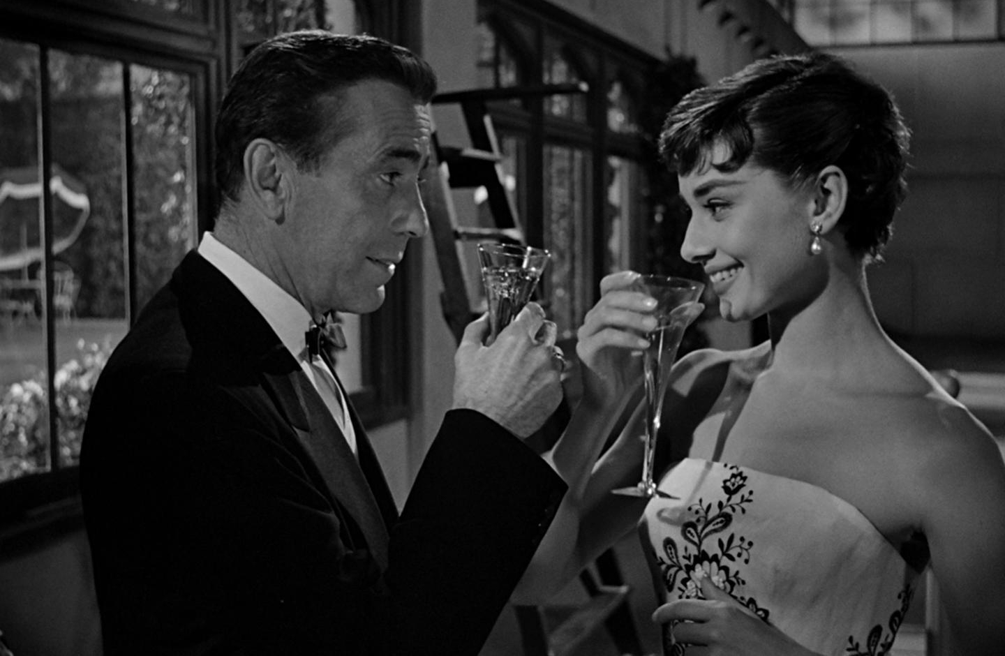 Audrey Hepburn with Humphrey Bogart in film Sabrina(1954)