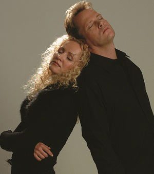 Secret Garden duo Irish violinist Fionnuala Sherry and Norwegian pianist Rolf Løvland portrait with closed eyes