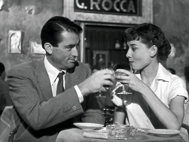 Gregory Peck and Audrey Hepburn in film Roman Holiday(1953)