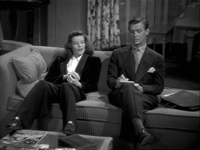 Elegant style icon wardrobe essentials: Kathrine Hepburn in white shirt