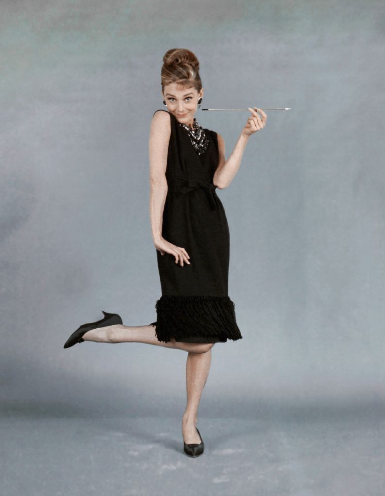 Audrey Hepburn movie costume in film Breakfast at Tiffany's(1961), the complete wardrobe of Holly Golightly:Black sleeveless knee length dress with tie belt and hem fringes