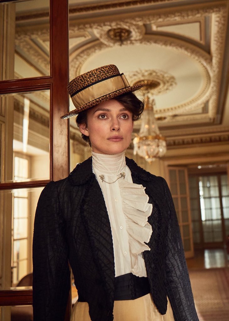Elegant icon wardrobe essentials: Keira Knightly in white shirt: Keira Knightley in film Colette(2018)