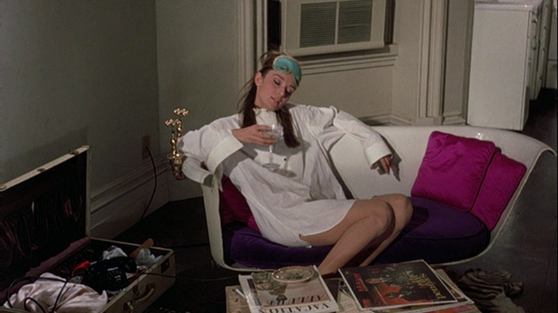 Audrey Hepburn movie costume in film Breakfast at Tiffany's(1961), the complete wardrobe of Holly Golightly:White oversize white blouse with front buttoned bib panel