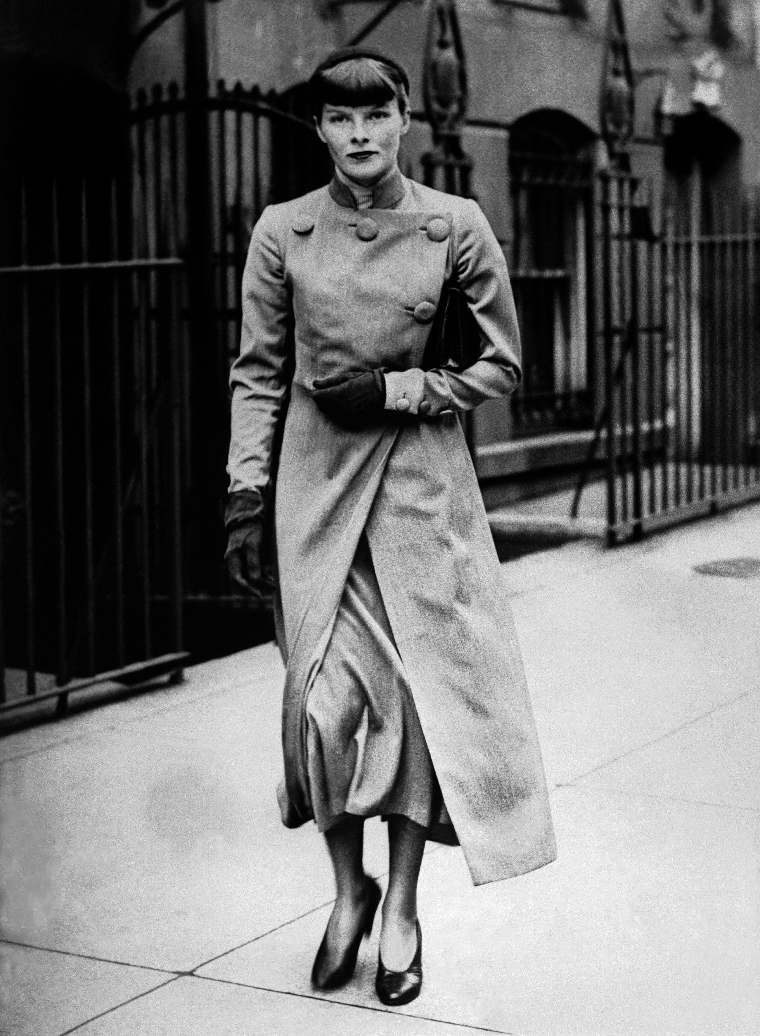 Katharine Hepburn young walking down the street