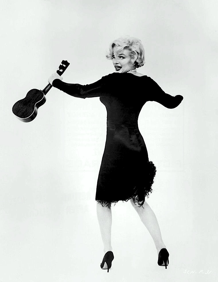 Marilyn Monroe in film Some Like It Hot(1959) wearing black dress designed by Orry Kelly