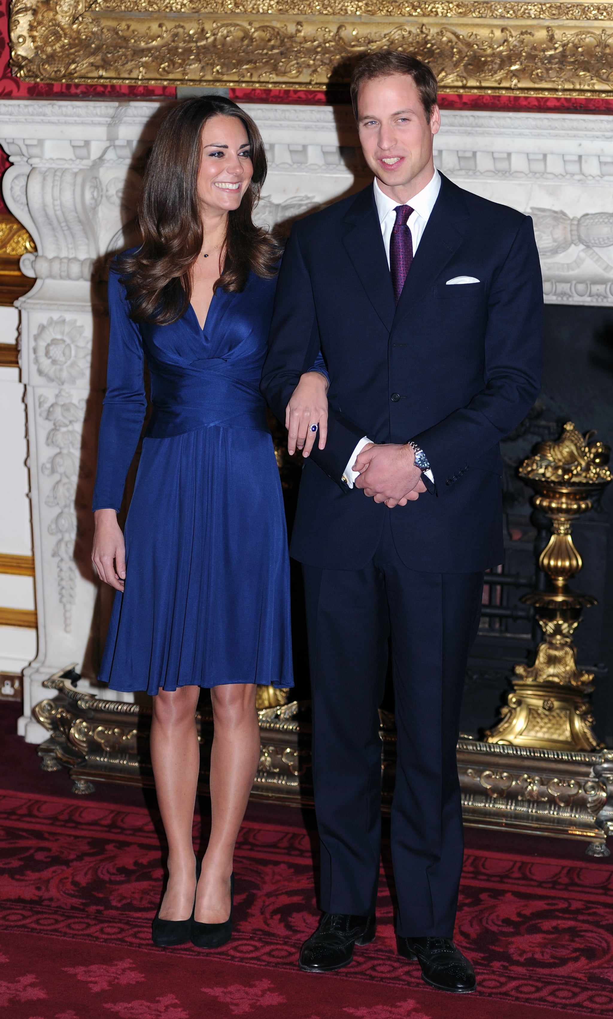 Kate Middleton blue silk jersey knit wrap dress by Issa London or her announcement of engagement with Prince William