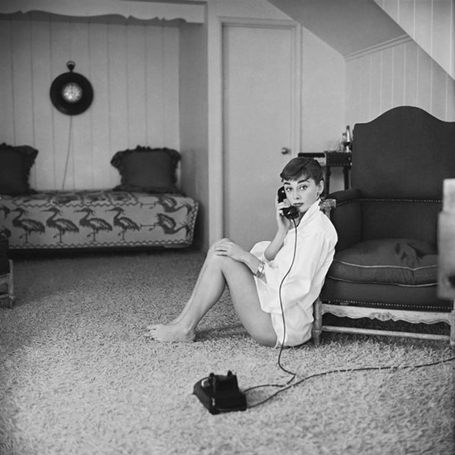 Audrey Hepburn in white shirt at home, photo by Mark Shaw