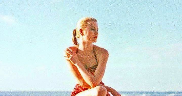 Elegant style icon wardrobe essentials: Grace Kelly in swimwear, a halter neck printed one piece swimming suit