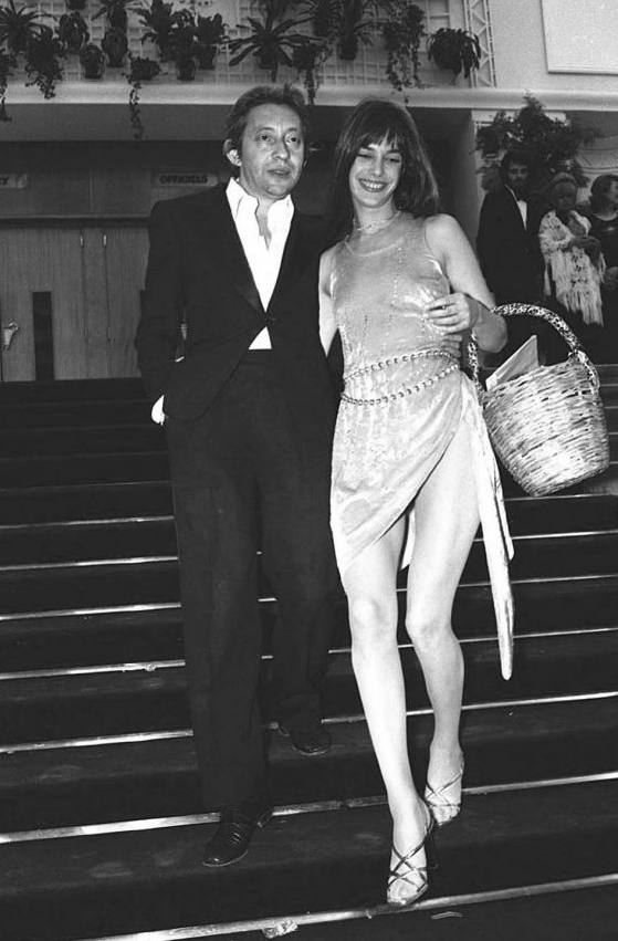 Jane Birkin carrying her omnipresent wicker basket, with Serge Gainsbourg