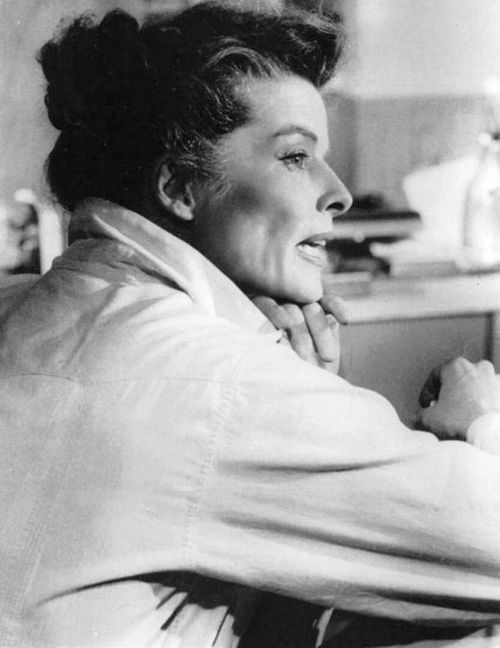 Elegant style icon wardrobe essentials: Kathrine Hepburn in white shirt