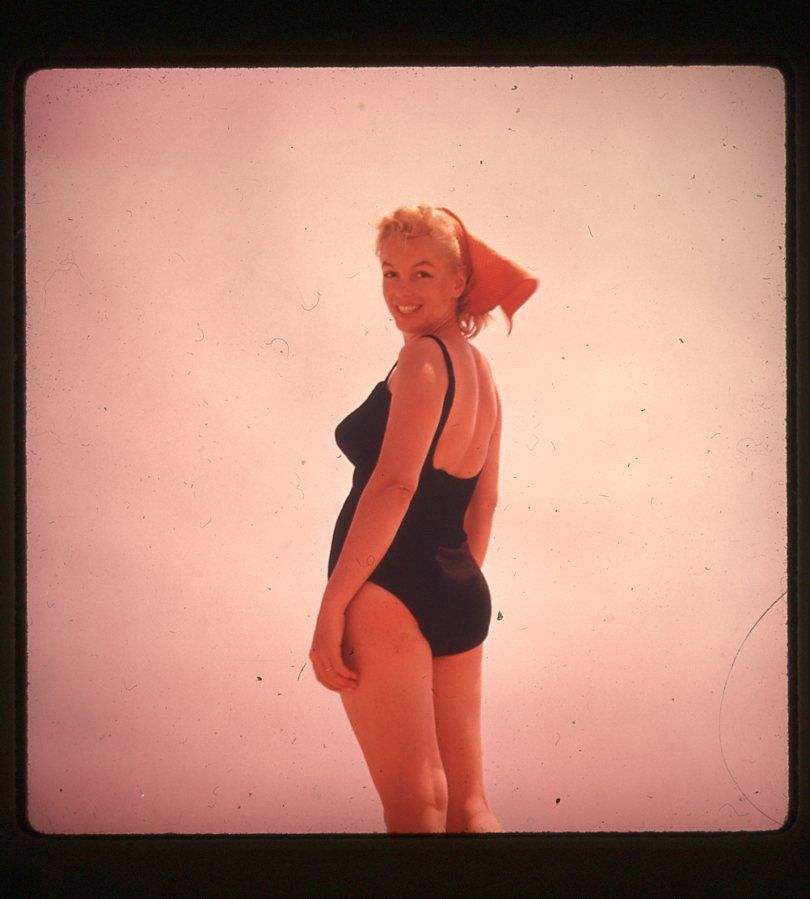 Elegant style icon wardrobe essentials: Marilyn Monroe in swimwear, a one piece swimming suit bathing suit