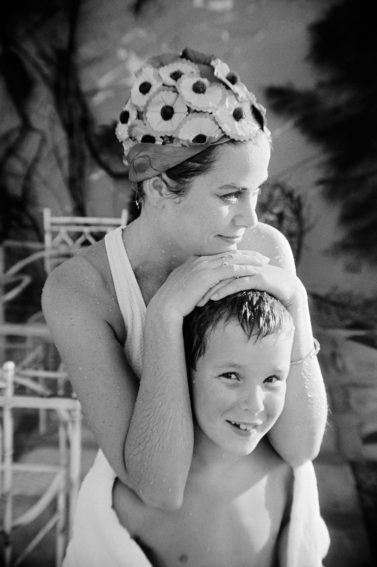 Elegant style icon wardrobe essentials: Grace Kelly in swimwear, a halter neck one piece swimming suit