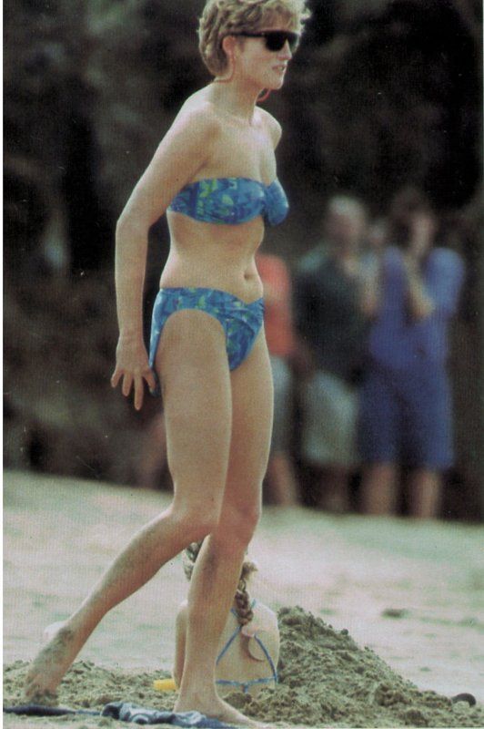 Elegant style icon wardrobe essentials: Princess Diana in swimwear, a two piece strapless bikini with floral print