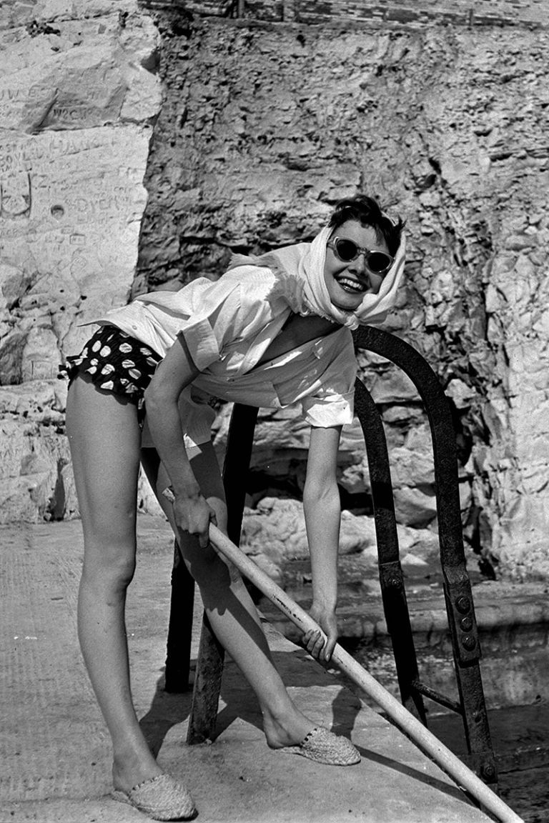 Elegant style icon wardrobe essentials: Audrey Hepburn in shorts