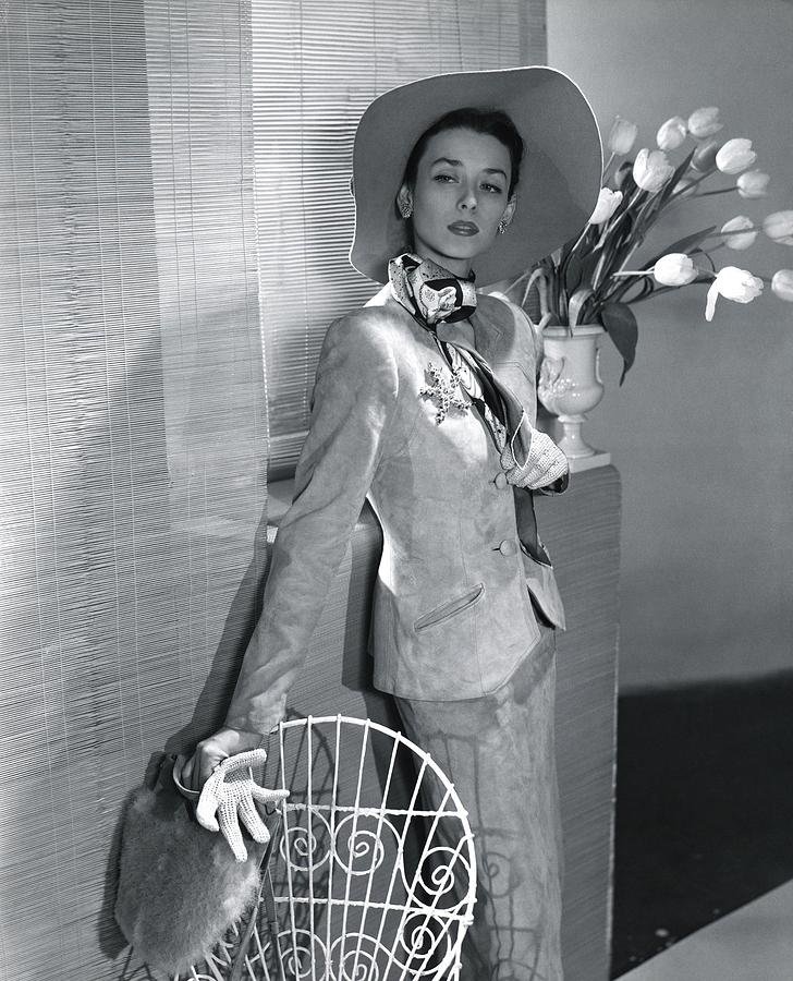Dorian Leigh in Bernath suede suit, photo by Horst. P. Horst
