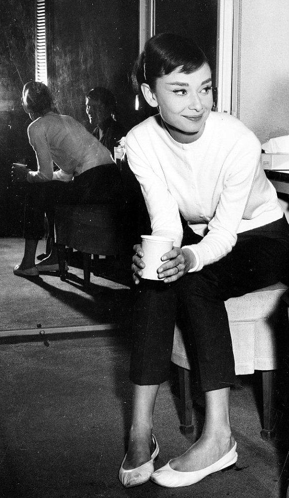 Elegant style icon wardrobe essentials: Audrey Hepburn in cardigan sweater
