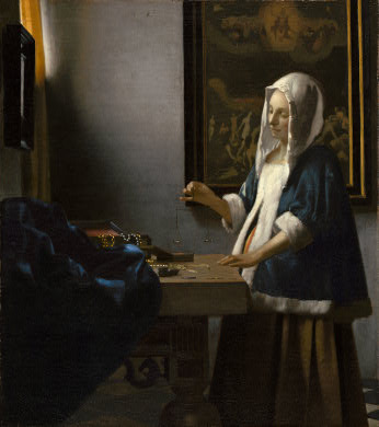 Woman holding a balance