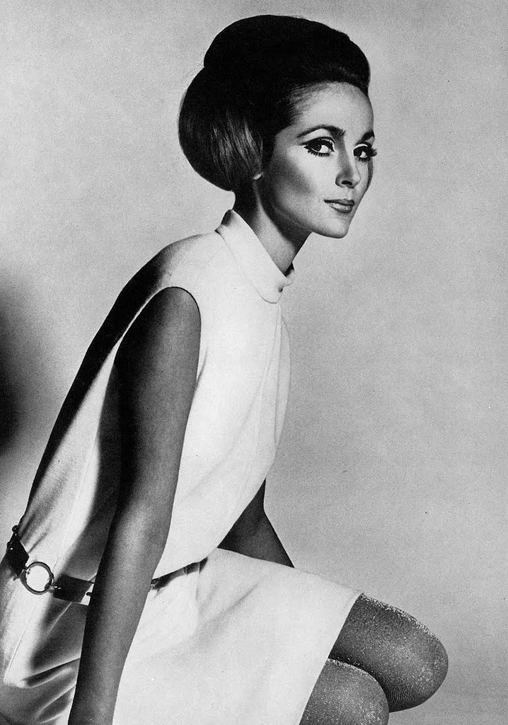 Model in wool jersey shift by Dorville, photo Henry Clarke