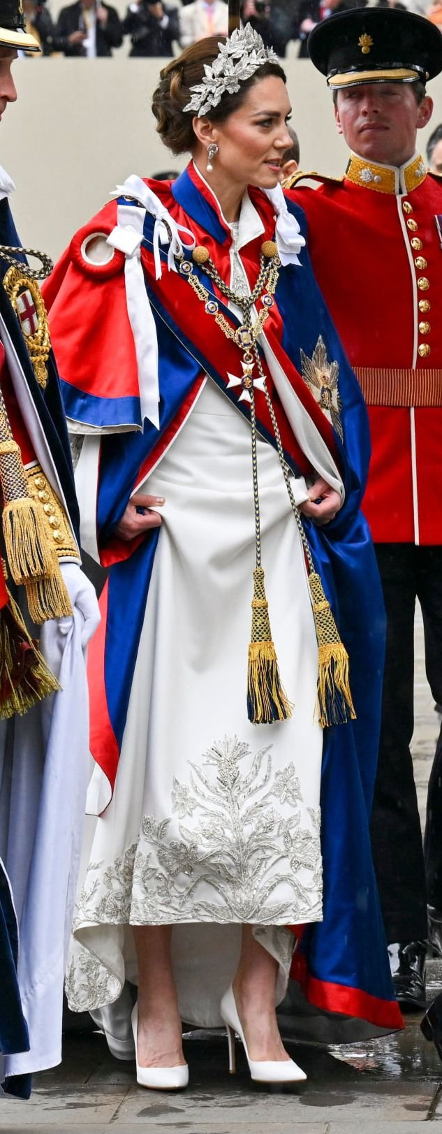 Kate Middleton wore an ivory silk gown custom made by Alexander McQueen for King Charles III's coronation ceremony, 6th May, 2023