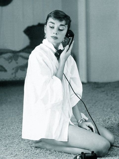 Audrey Hepburn in white shirt at home, photo by Mark Shaw