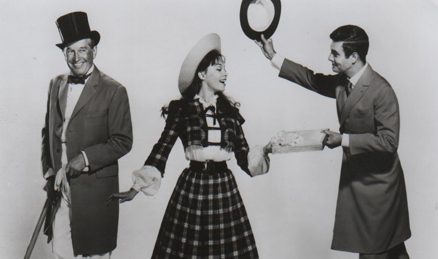 Leslie Caron in Gigi (1958) with Louis Jourdan and Maurice Chevalier.