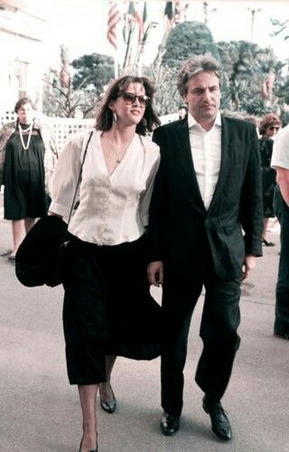 Elegant style icon wardrobe essentials: Sophie Marceau in white shirt