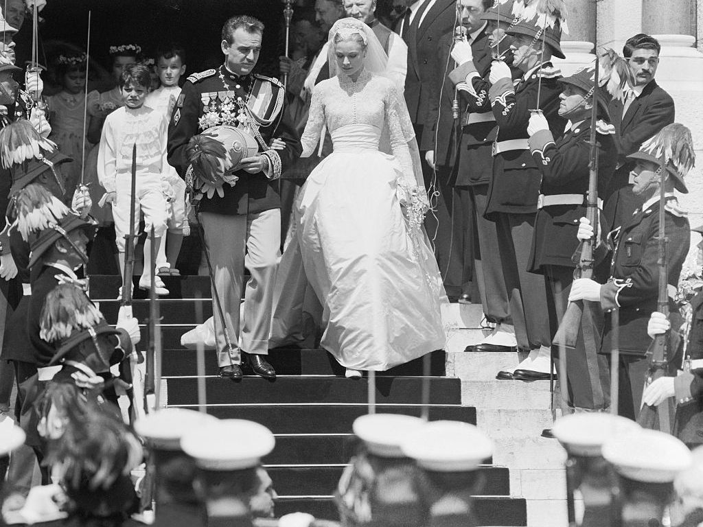 Grace Kelly with Prince Rainier at their wedding ceremony, 1956