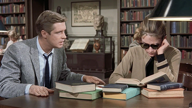 Audrey Hepburn movie costume in film Breakfast at Tiffany's(1961), the complete wardrobe of Holly Golightly:Camel colored cardigan with black mock neck sweater and black pants
