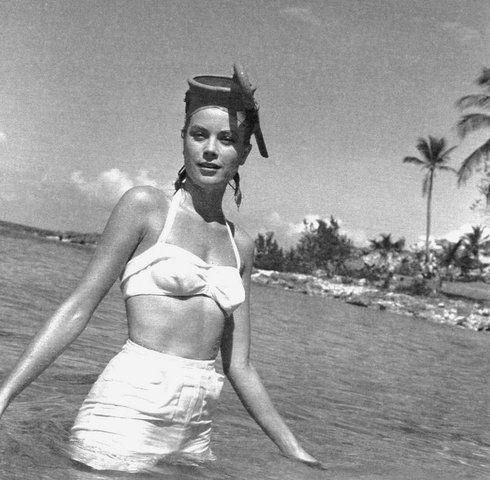 Elegant style icon wardrobe essentials: Grace Kelly in swimwear, a halter neck bikini