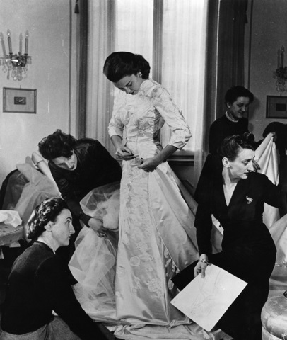 Linda Christian tried on her wedding wedding gown, by Sorella Fontana, before her wedding to Tyrone Power, Rome, Italy, 1949