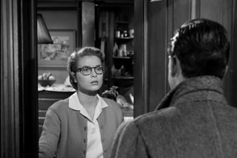 Elegant style icon wardrobe essentials: Grace Kelly in cardigan sweater: Grace Kelly wearing cardigan sweater in film The Country Girl(1954)