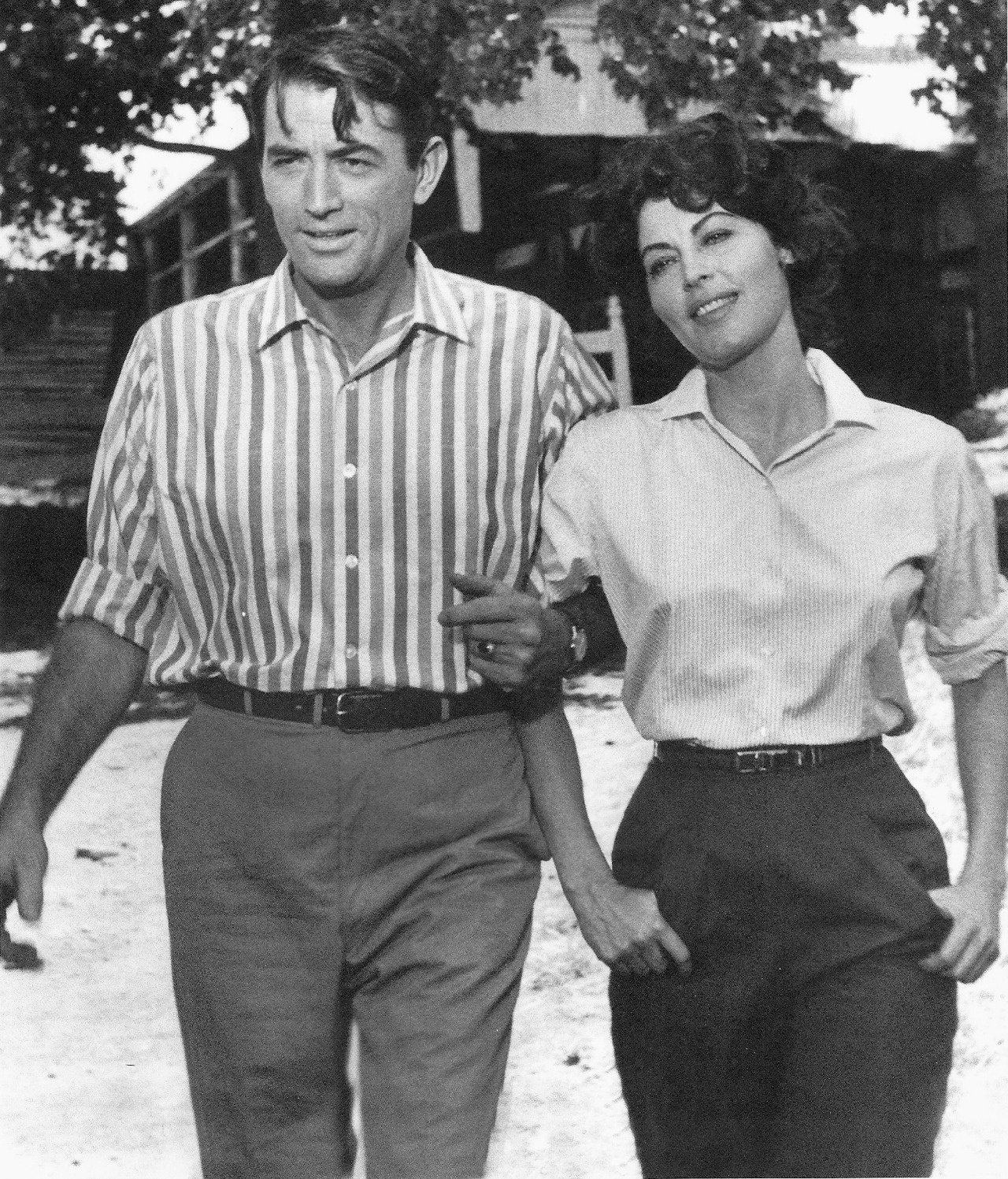 Gregory Peck with Ava Gardner, his co-star for three films and friend, filming On the Beach(1959)