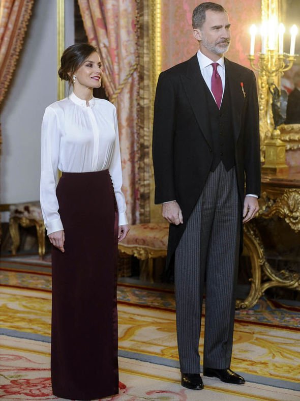 Queen Letizia burgundy maxi skirt with satin band and side buttons custom made by Felipe Varela