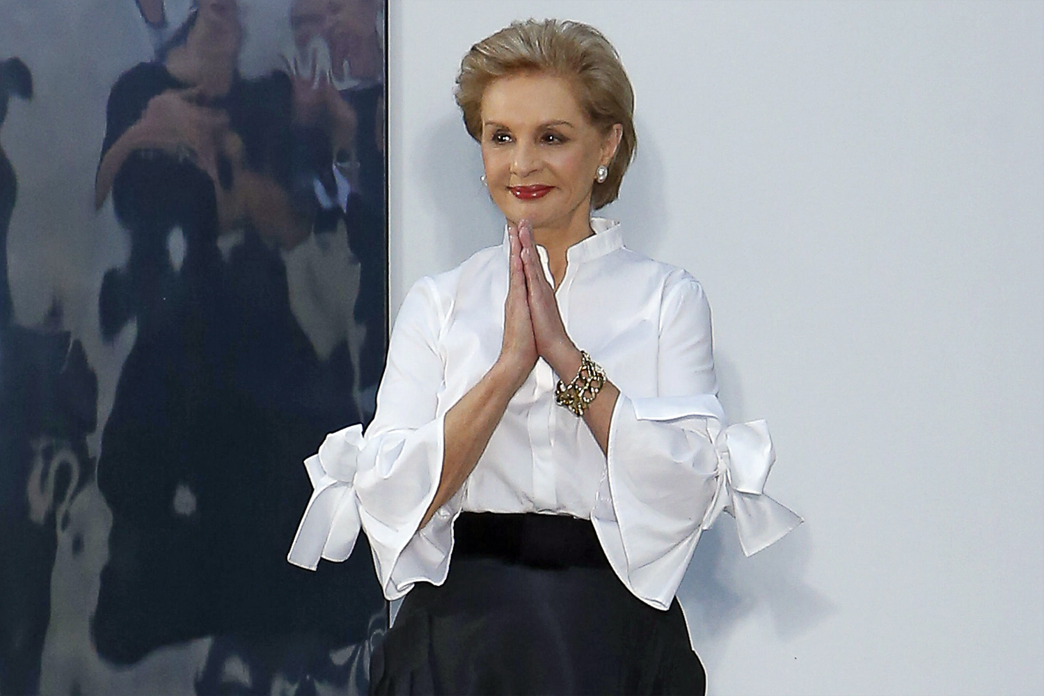 Elegant style icon wardrobe essentials: Carolina Herrera in white shirt