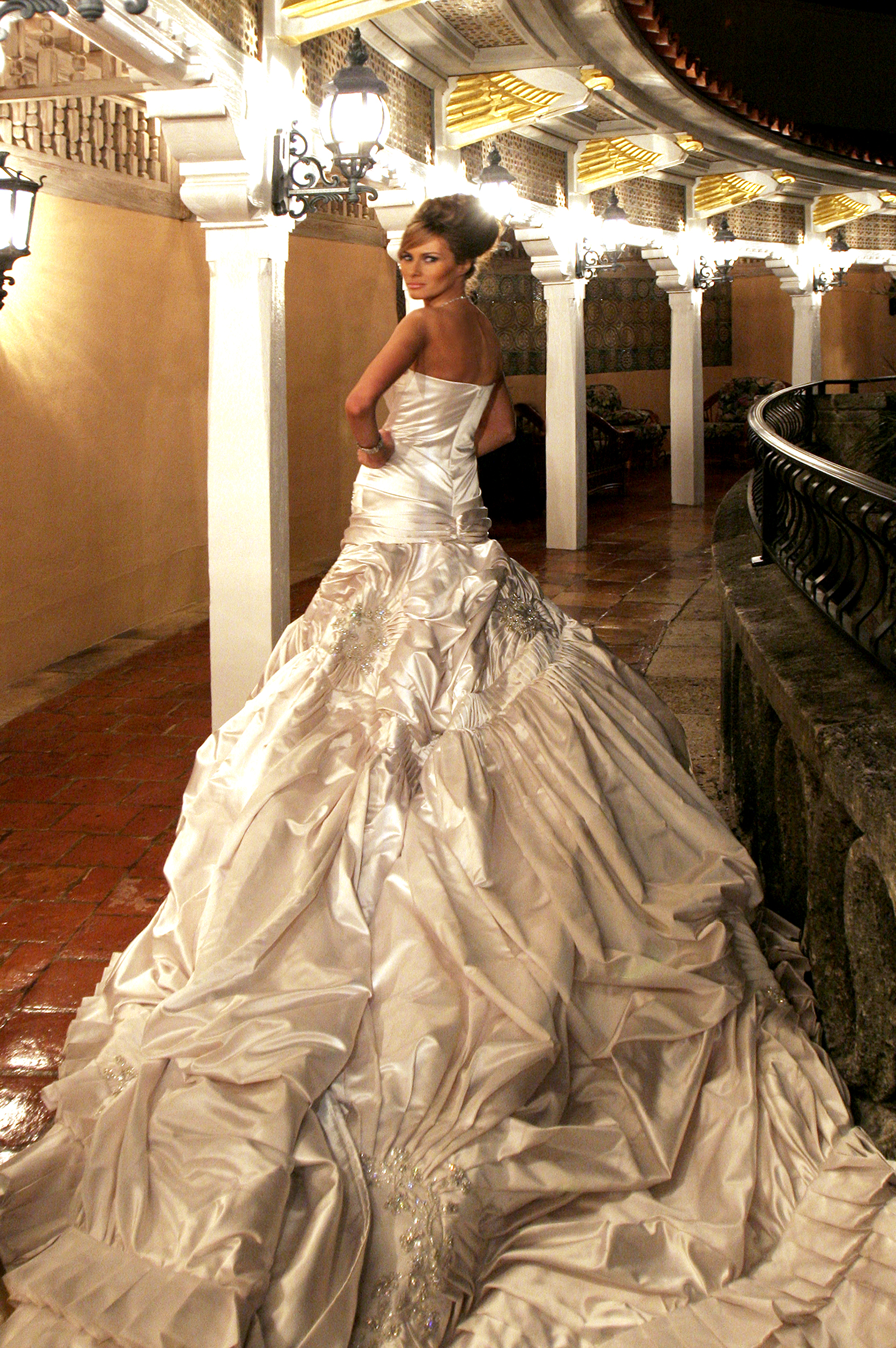 Melania Trump in her wedding gown made by John Galliano of the house of Christian Dior