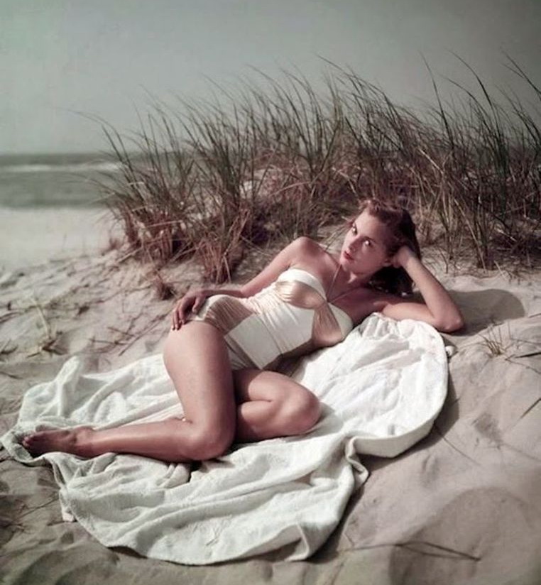 Elegant style icon wardrobe essentials: Grace Kelly in swimwear, a halter neck one piece swimming suit