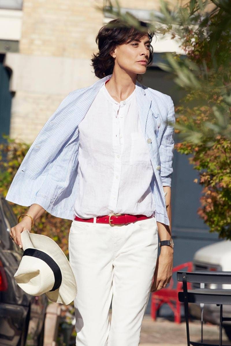 Elegant icon wardrobe essentials: Inès de La Fressange in white shirt