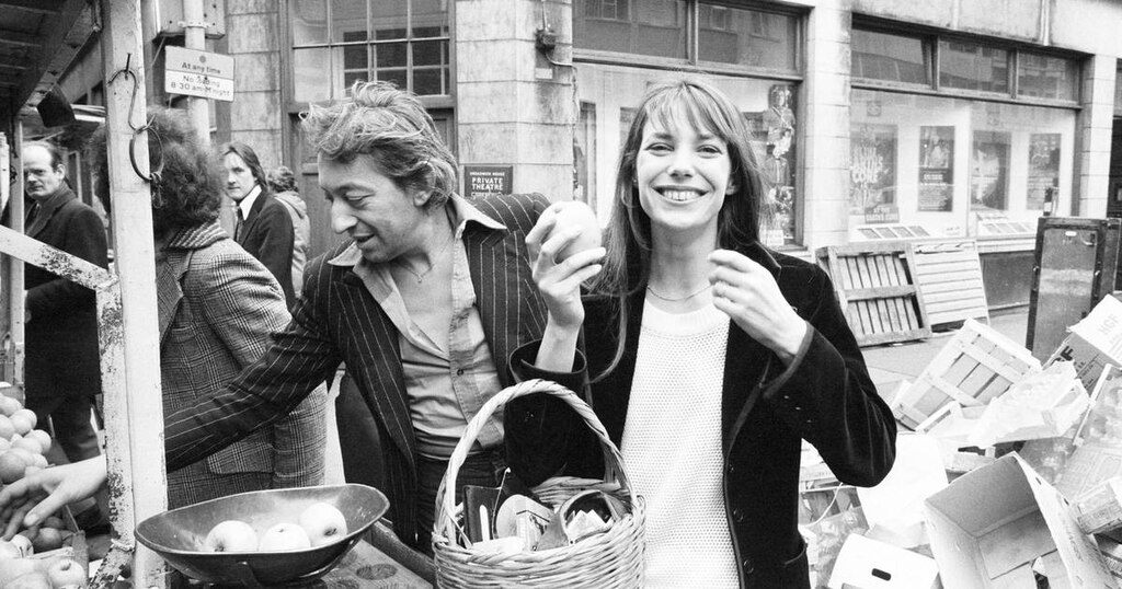 Jane Birkin carrying a straw basket, with Serge Gainsbourg