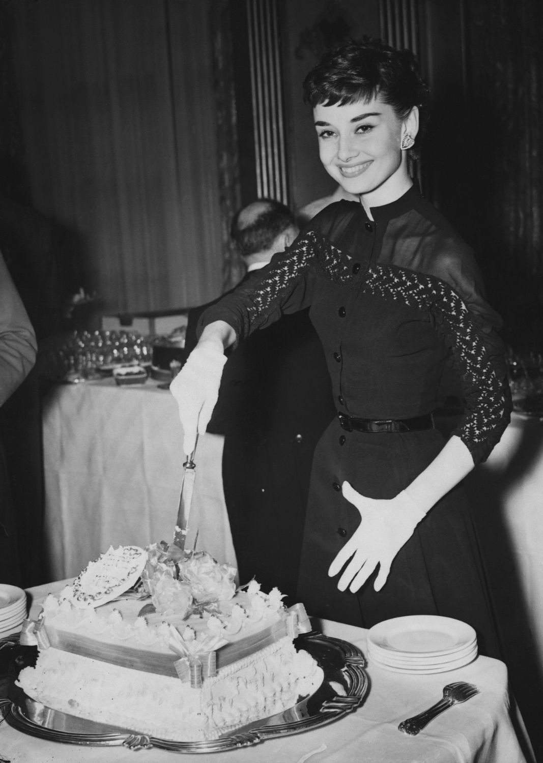 Elegant style icon wardrobe essentials: Audrey Hepburn in little black dress